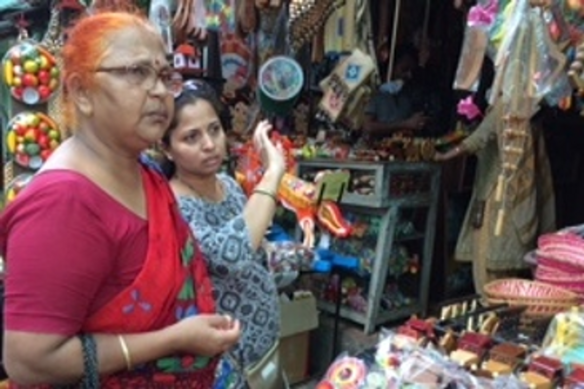 Saarang's mother-daughter founders visiting a handicraft market