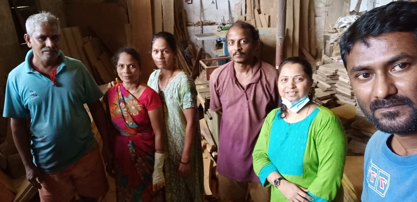 Saarang's artisan team inside a wooden craft workshop